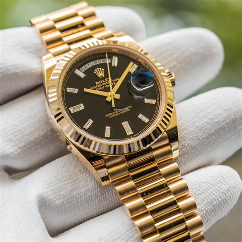 rolex day date 40 gold